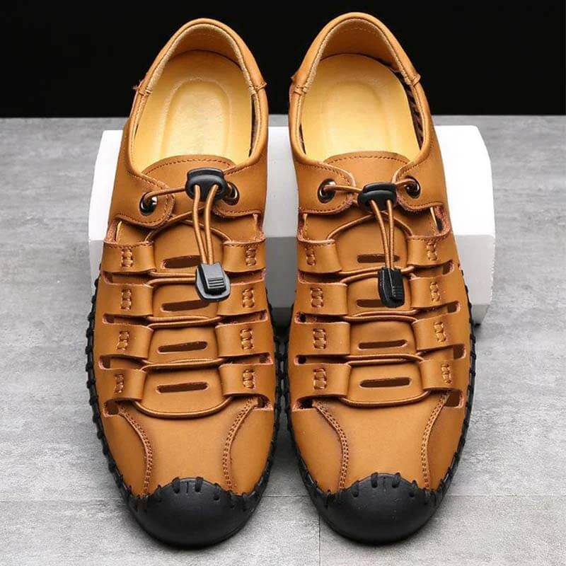 Las sandalias para hombres usan zapatos de agujero de cuero de suela suave Sandalias huecas casuales