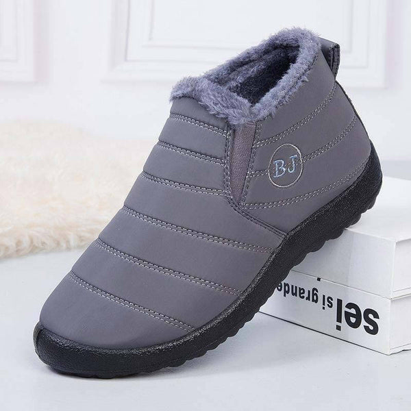Zapatillas de nieve cálidas para mujeres Fuera de piel al aire libre zapatos de invierno Anti-Slip Ligero de botín Bootie