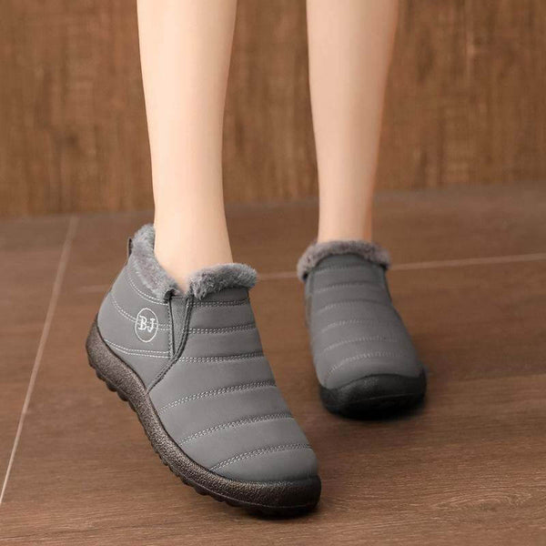 Zapatillas de nieve cálidas para mujeres Fuera de piel al aire libre zapatos de invierno Anti-Slip Ligero de botín Bootie