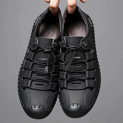 Las sandalias para hombres usan zapatos de agujero de cuero de suela suave Sandalias huecas casuales