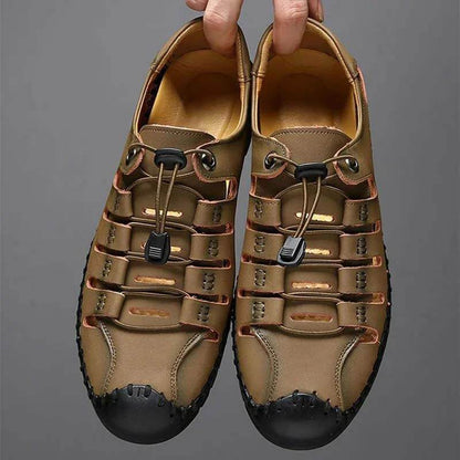 Las sandalias para hombres usan zapatos de agujero de cuero de suela suave Sandalias huecas casuales