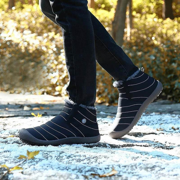 Las zapatillas de nieve de invierno para hombres se deslizan sobre los botines de los botines antideslizan las zapatillas de piel resistentes al agua resistente al agua al aire libre