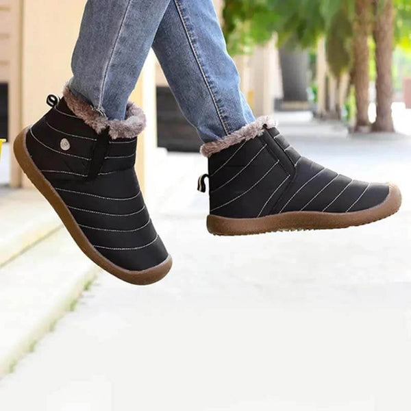 Las zapatillas de nieve de invierno para hombres se deslizan sobre los botines de los botines antideslizan las zapatillas de piel resistentes al agua resistente al agua al aire libre