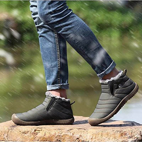 Las zapatillas de nieve de invierno para hombres se deslizan sobre los botines de los botines antideslizan las zapatillas de piel resistentes al agua resistente al agua al aire libre